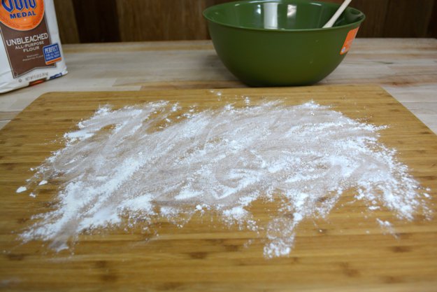 Sprinkle a good amount of flour on your work surface and your hands.