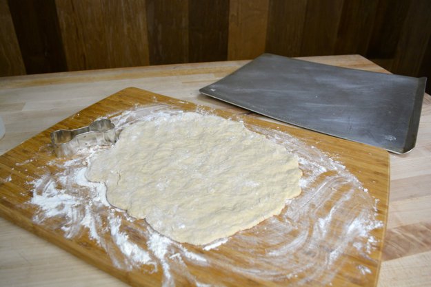 Use a rolling pin to spread out the dough.